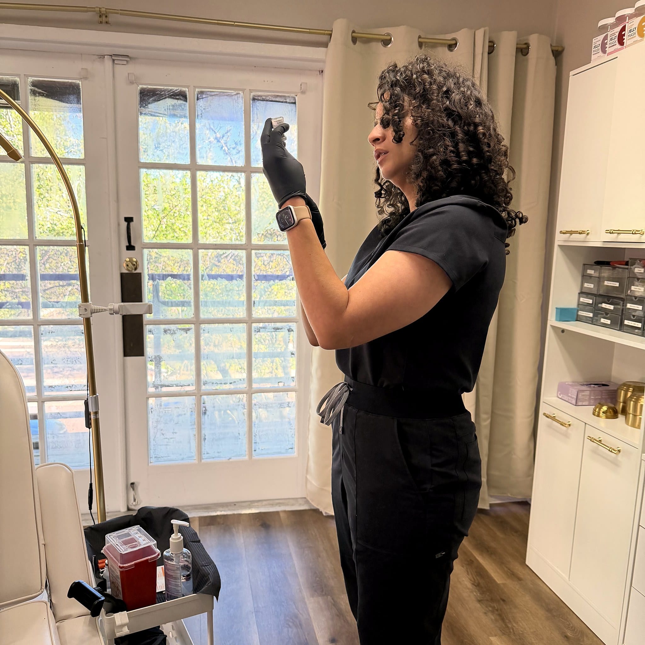 Physician preparing for a concierge medical aesthetics visit in Lutz, FL